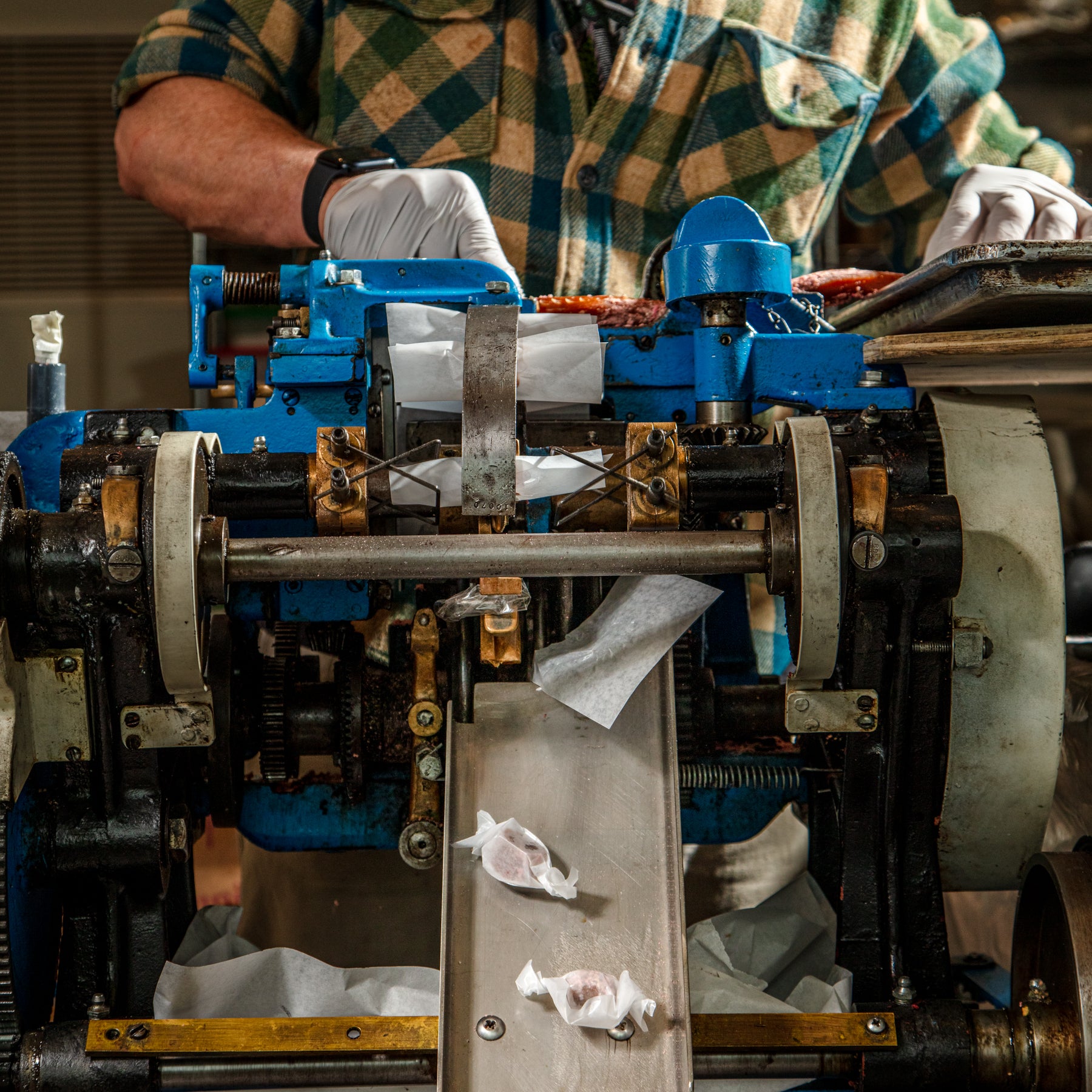Handmade caramel production at Little Apple Treats using Virgil, our historic taffy-wrapping machine from 1906 in Sebastopol
