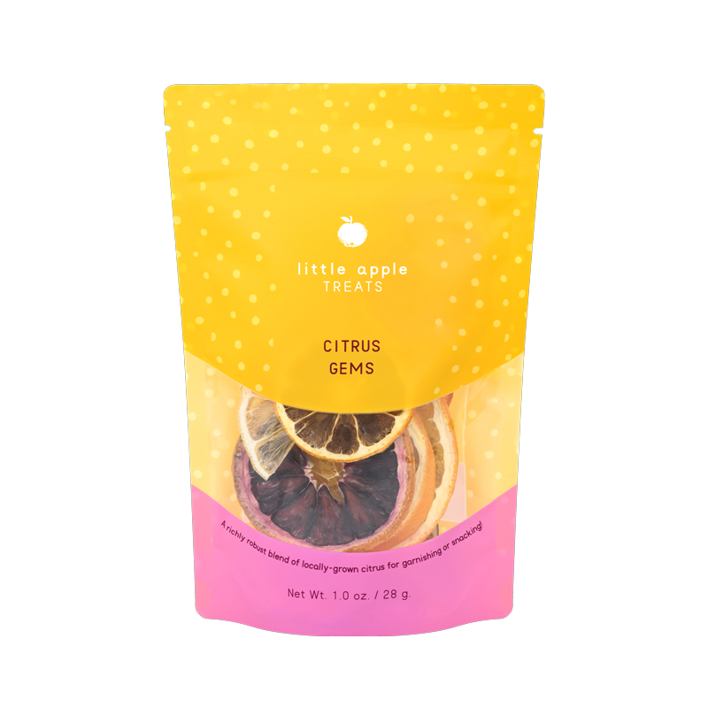Our California Citrus Gems in a pink and yellow, bright and colorful pouch