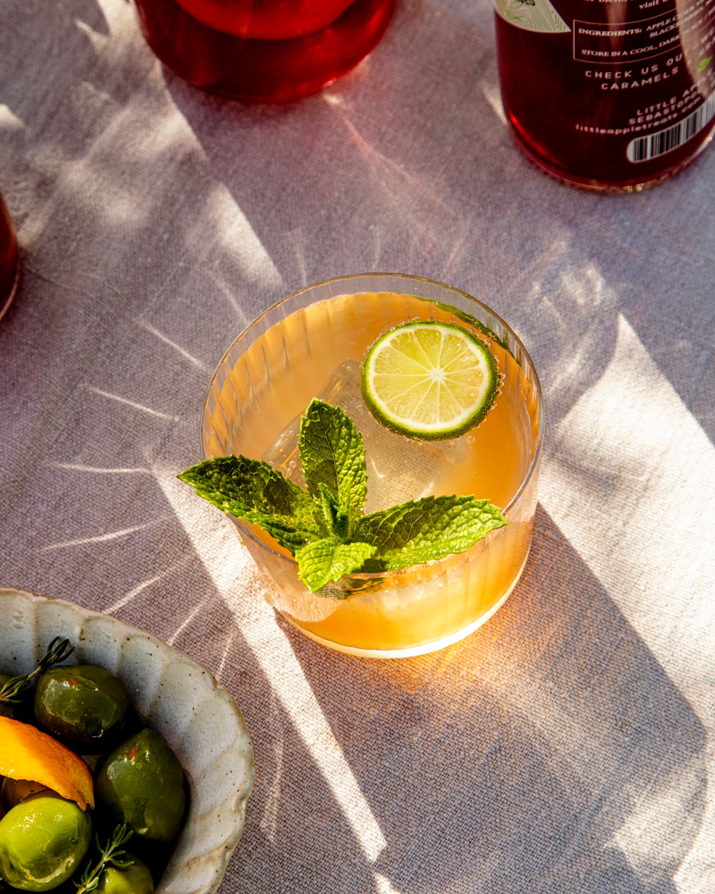 Mocktail make with Little Apple Treats Passionfruit, blood orange and guava shrub made with the heirloom apples from our organic orchard.
